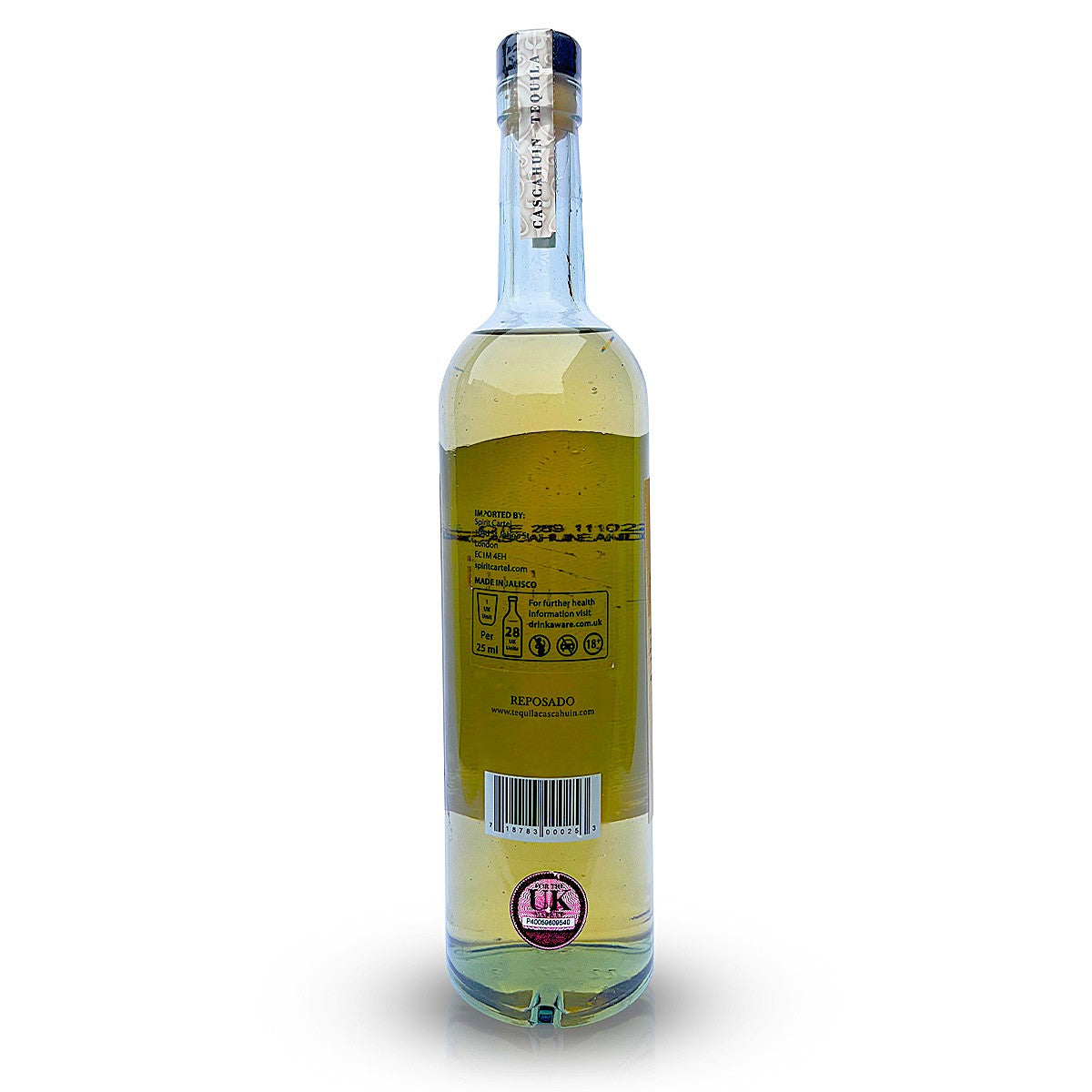 Back view of a 700ml bottle of Cascahuin Reposado Tequila featuring a clear glass design that allows for a perfect view of the golden colour tequila reposado inside. The outside of the bottle is adorned with labels specifically designed for the UK market.