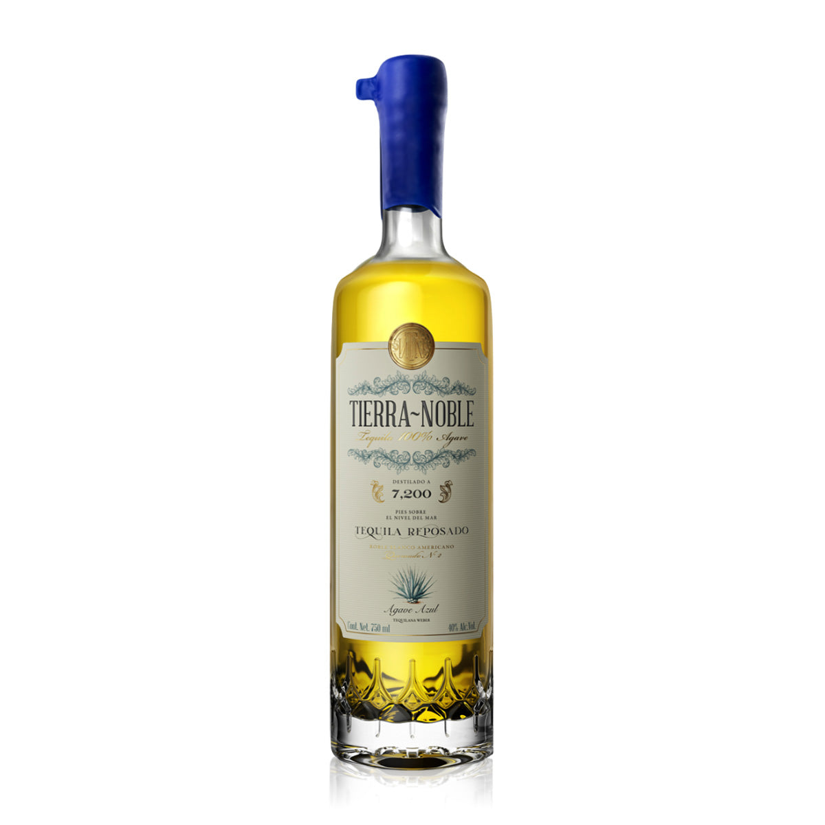 Clear glass bottle containing 700ml of light straw coloured Tierra Noble Reposado Tequila.