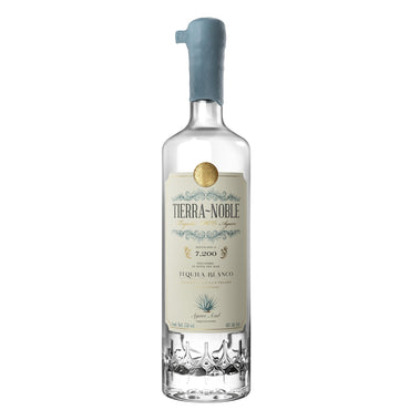 Clear glass bottle containing 700ml of Tierra Noble Blanco tequila.