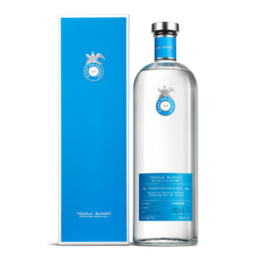 Casa Dragones Blanco tequila 1.75l magnum size bottle with blue label and matching box on a white background