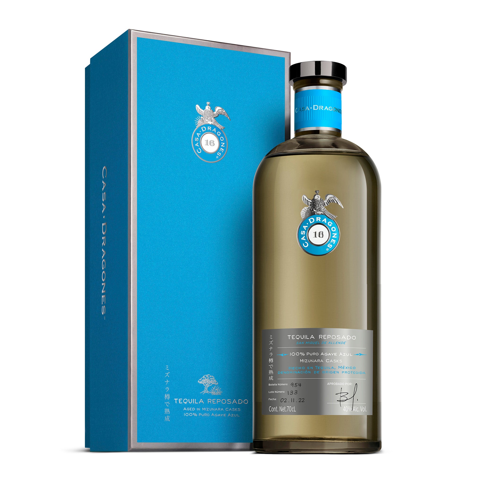 Casa Dragones Reposado tequila bottle and box on a white background