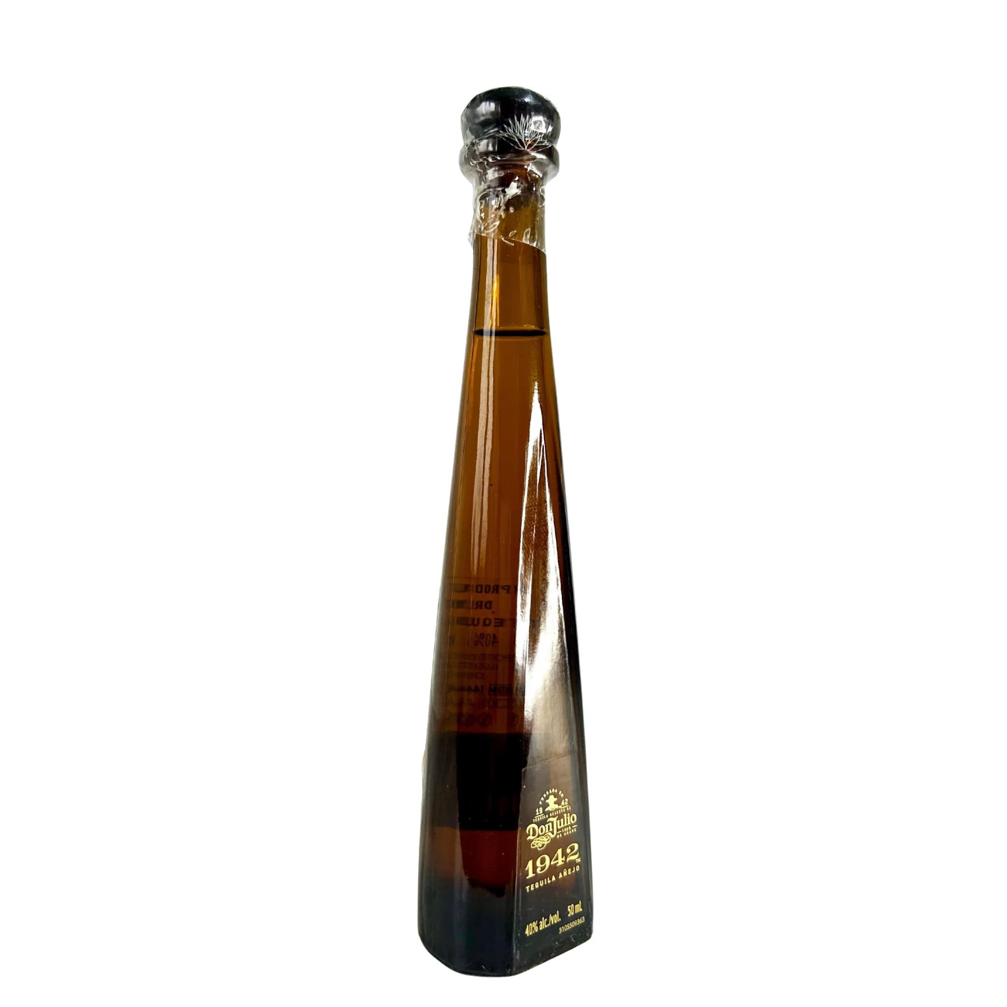 Don Julio 1942 tequila 50ml miniature bottle angled view on white background