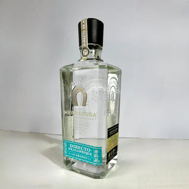 Herradura Directo de Alambique tequila bottle angled view